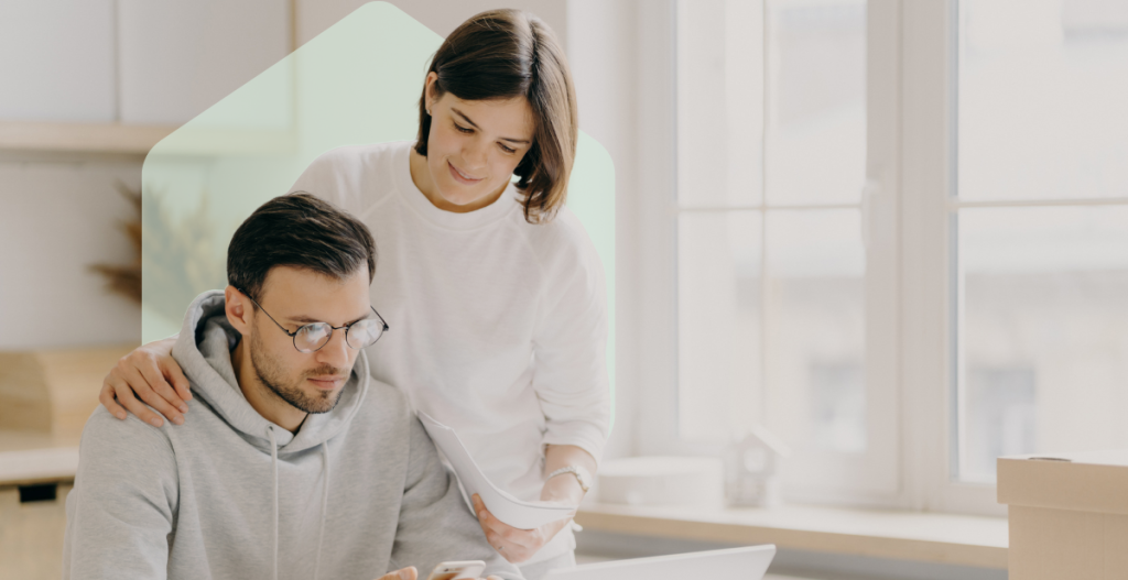 Remo Guide - Couple looking at home conveyancing quotes